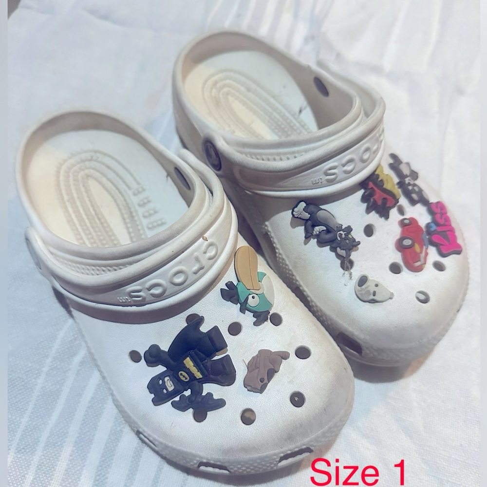 Kids size 1 crocs white with jibbitz